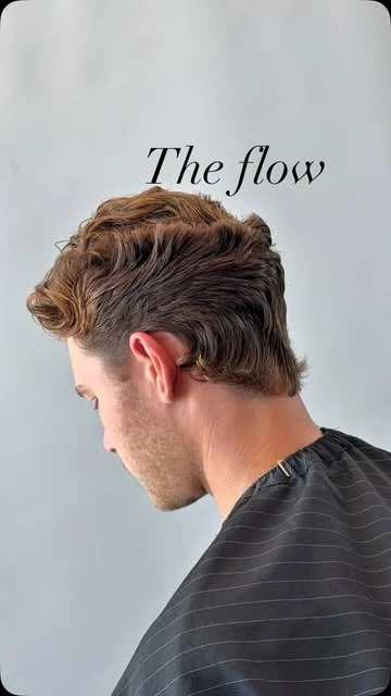A textured, swept-back haircut from Liam’s portfolio